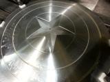 Star pattern CNC machined into shield.